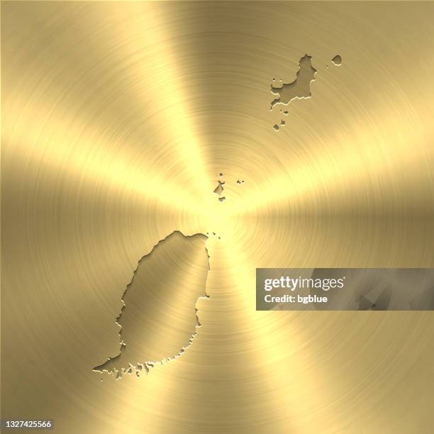 grenada map on gold background - circular brushed metal texture - grenada stock illustrations