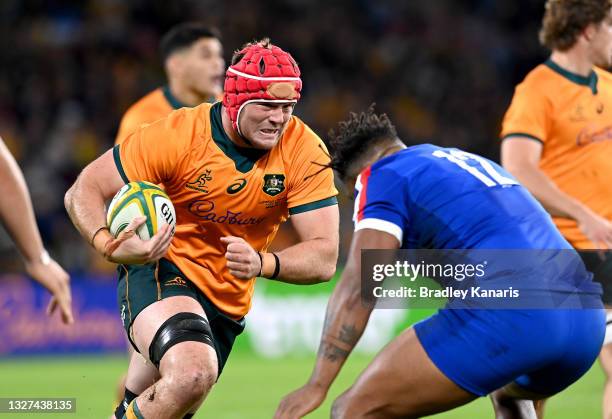 Harry Wilson of the Wallabies takes on the defence during the international Test match between the Australia Wallabies and France at Suncorp Stadium...