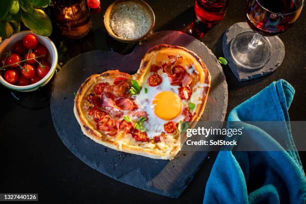 fried egg pizza - heart shape pizza stock pictures, royalty-free photos & images