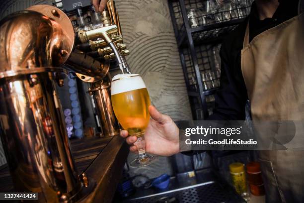 beer tap - wheat beer stock pictures, royalty-free photos & images