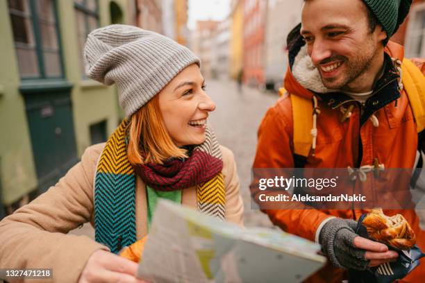 looking for our next sightseeing spot - deens broodje stockfoto's en -beelden