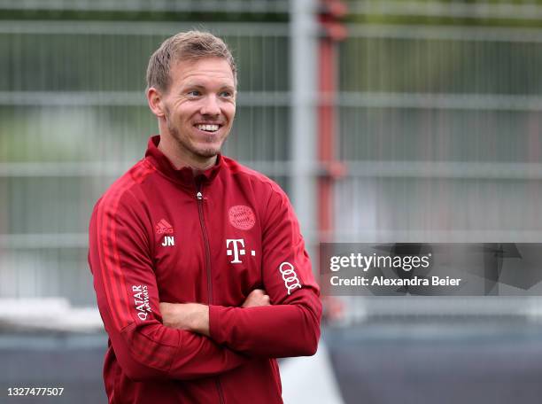 New team coach Julian Nagelsmann of FC Bayern Muenchen smiles during the first training session of the upcoming season 2021/2022 on July 07, 2021 in...