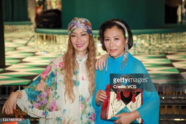 Singers Sammi Cheng Sau-man and Elizabeth Wang Ming-chun attend Gucci promotional event on July 7, 2021 in Hong Kong, China.