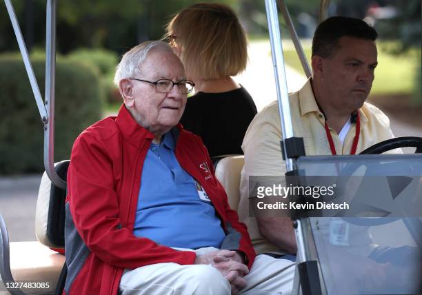 Chairman and CEO of Berkshire Hathaway Warren Buffett rides in a golf cart at the Allen & Company Sun Valley Conference on July 07, 2021 in Sun...