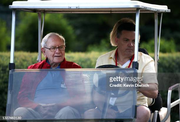 Chairman and CEO of Berkshire Hathaway Warren Buffett rides in a golf cart at the Allen & Company Sun Valley Conference on July 07, 2021 in Sun...