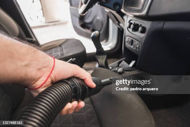 vacuuming the inside of a car - clean car interior stock pictures, royalty-free photos & images