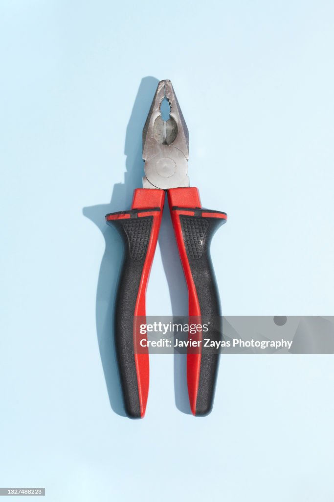 Pliers On Blue Background