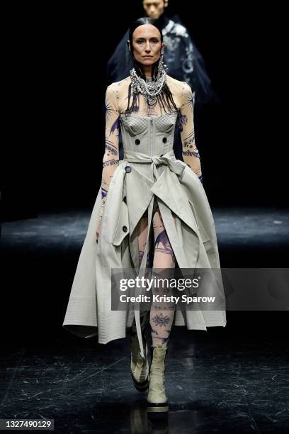 Model walks the runway during the Jean-Paul Gaultier Couture Haute Couture Fall/Winter 2021/2022 show as part of Paris Fashion Week on July 07, 2021...