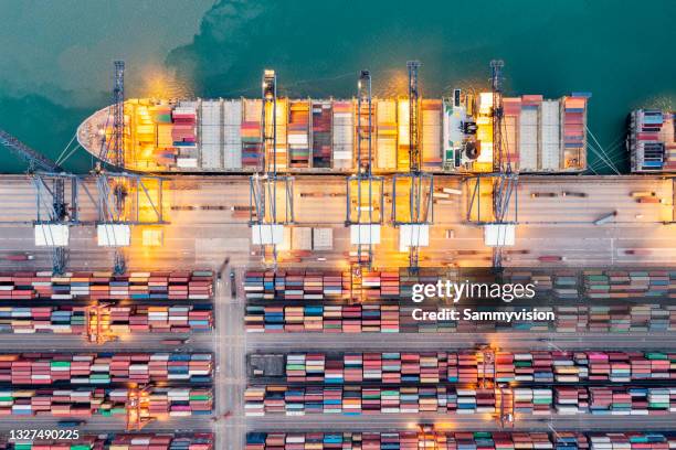 cranes and containers in port - electric delivery truck stock pictures, royalty-free photos & images