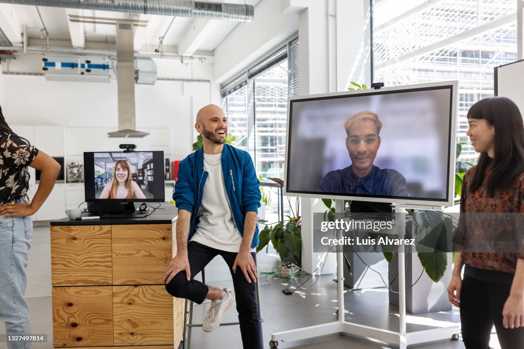 Business meeting in hybrid office