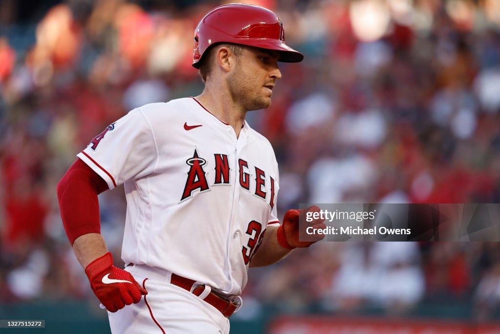 Max Stassi Max Stassi of the Los Angeles Angels rounds third base after hitting ...