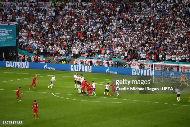 Mikkel Damsgaard of Denmark scores their side's first goal past Jordan Pickford of England during the UEFA Euro 2020 Championship Semi-final match...