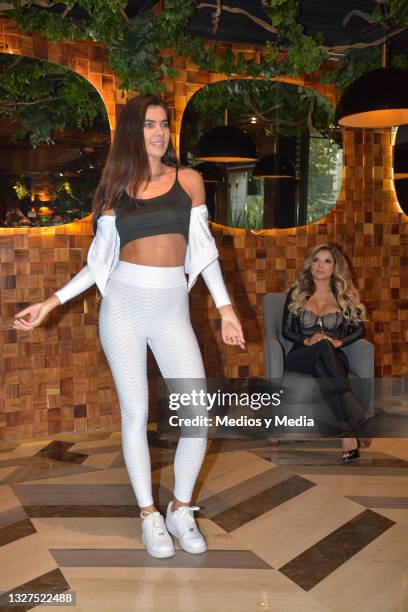 Woman models clothes during the presentation of the clothing brand "SENSUALE" by Aleida Núñez at Prime Bar Maneiro on July 5, 2021 in Mexico City,...