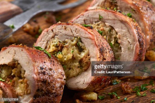 stuffed pork tenderloin - filling stockfoto's en -beelden