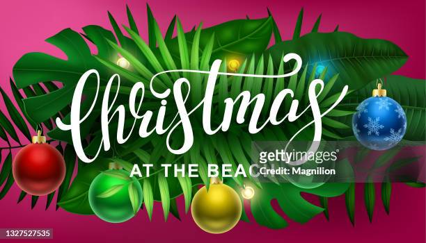 summer christmas, tropical leaves with christmas decorations and garlands - christmas palm tree stock illustrations