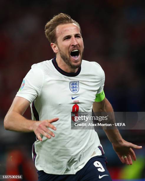 Harry Kane of England celebrates after scoring their team's second goal during the UEFA Euro 2020 Championship Semi-final match between England and...