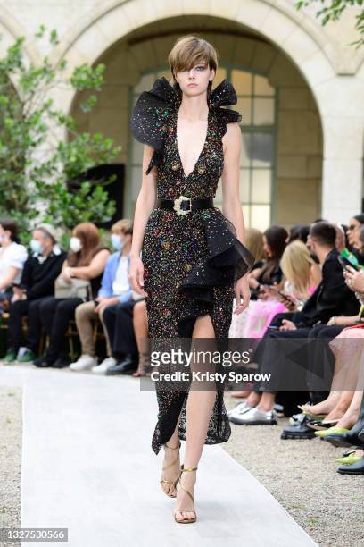 Model walks the runway during the Zuhair Murad Couture Haute Couture Fall/Winter 2021/2022 show as part of Paris Fashion Week on July 07, 2021 in...