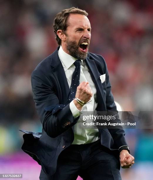 Gareth Southgate, Head Coach of England celebrates their side's victory after the UEFA Euro 2020 Championship Semi-final match between England and...