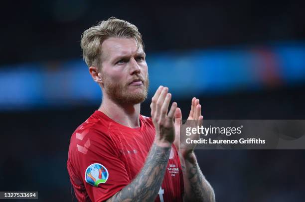 Simon Kjaer of Denmark applauds the fans following defeat in the UEFA Euro 2020 Championship Semi-final match between England and Denmark at Wembley...
