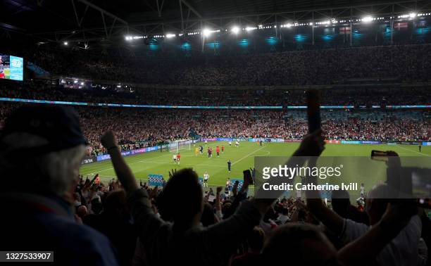 General view inside the stadium england fans show their appreciation as the England players and staff celebrate following their team's victory in the...