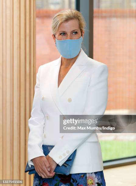 Sophie, Countess of Wessex wears a face mask as she visits the Guide Dogs for the Blind Association to open their new south west regional centre and...