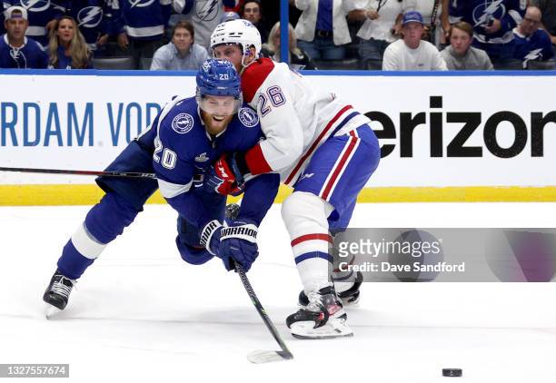 Jeff Petry of the Montreal Canadiens plays the body on a play to the net by Blake Coleman of the Tampa Bay Lightning during the second period of Game...