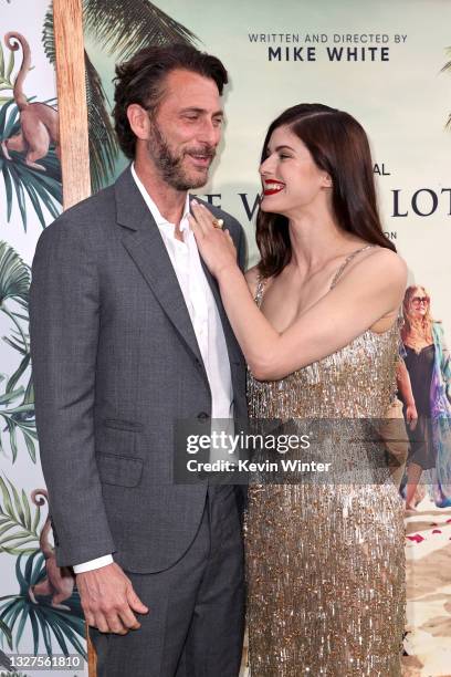 Andrew Form and Alexandra Daddario attend the Los Angeles premiere of the new HBO Limited Series "The White Lotus" at Bel-Air Bay Club on July 07,...