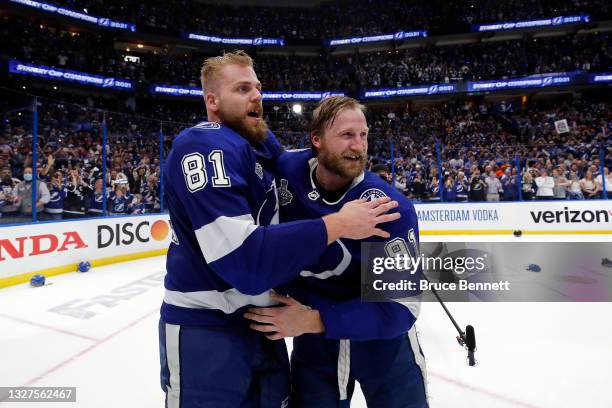 Steven Stamkos and Erik Cernak of the Tampa Bay Lightning celebrate after their 1-0 victory against the Montreal Canadiens in Game Five to win the...