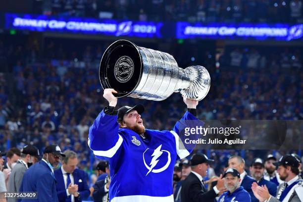 Andrei Vasilevskiy of the Tampa Bay Lightning hoists the Stanley Cup after the 1-0 victory against the Montreal Canadiens in Game Five to win the...
