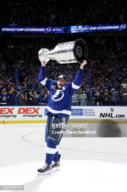 Steven Stamkos of the Tampa Bay Lightning hoists the Stanley Cup after their 1-0 win in Game Five of the 2021 Stanley Cup Final to win the series...
