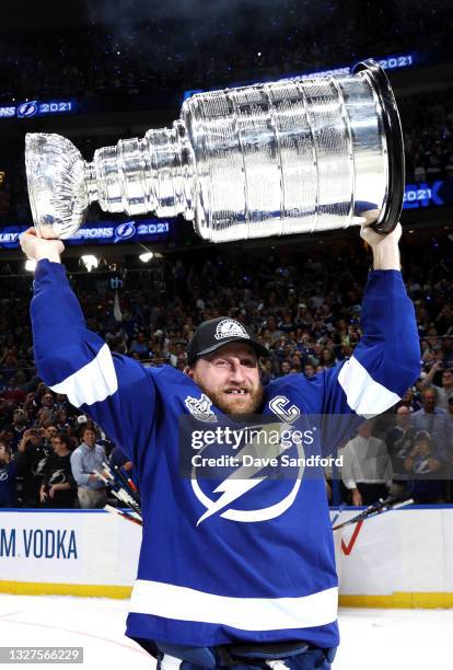 Steven Stamkos of the Tampa Bay Lightning hoists the Stanley Cup after their 1-0 win in Game Five of the 2021 Stanley Cup Final to win the series...