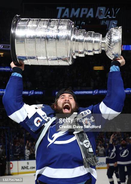 Pat Maroon of the Tampa Bay Lightning hoists the Stanley Cup after their 1-0 win in Game Five of the 2021 Stanley Cup Final to win the series four...