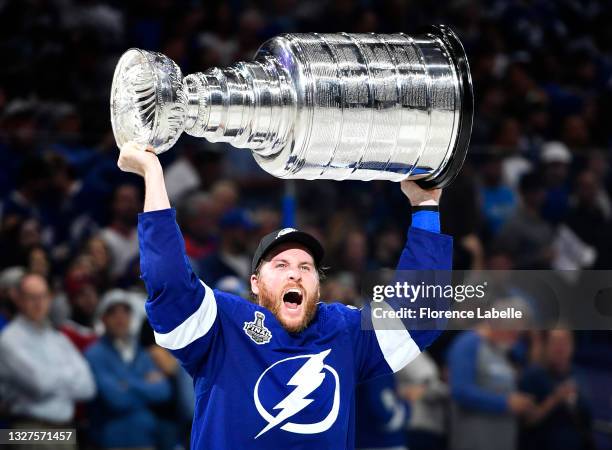 Blake Coleman of the Tampa Bay Lightning hoists the Stanley Cup after their 1-0 victory in Game Five of the 2021 Stanley Cup Final to win the series...