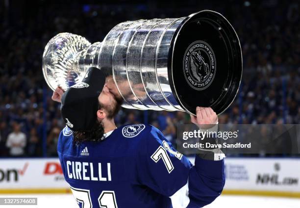 Anthony Cirelli of the Tampa Bay Lightning kisses the Stanley Cup after their 1-0 victory in Game Five of the 2021 Stanley Cup Final to win the...