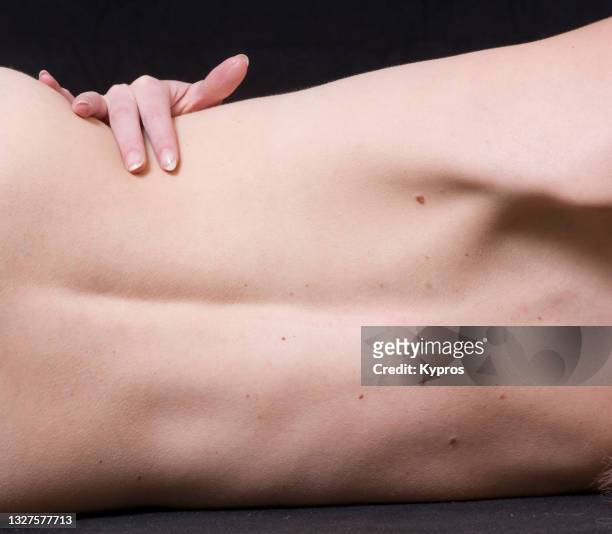 woman's hand massaging her back - beautiful czech women 個照片及圖片檔