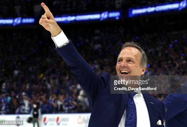 Head coach Jon Cooper of the Tampa Bay Lightning points to the stands after their 1-0 victory in Game Five of the 2021 Stanley Cup Final to win the...