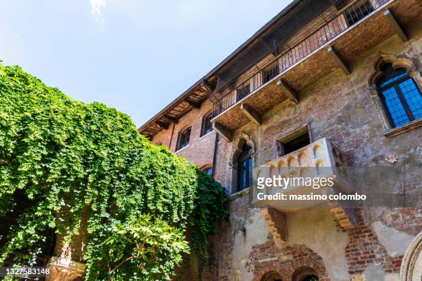iconic balcony of juliet's house in verona city - juliet capulet stock pictures, royalty-free photos & images