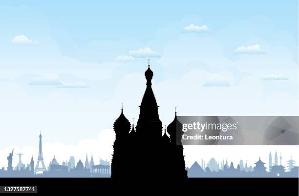 saint basil's cathedral silhouette, moscow, with monuments behind - kremlin building stock illustrations