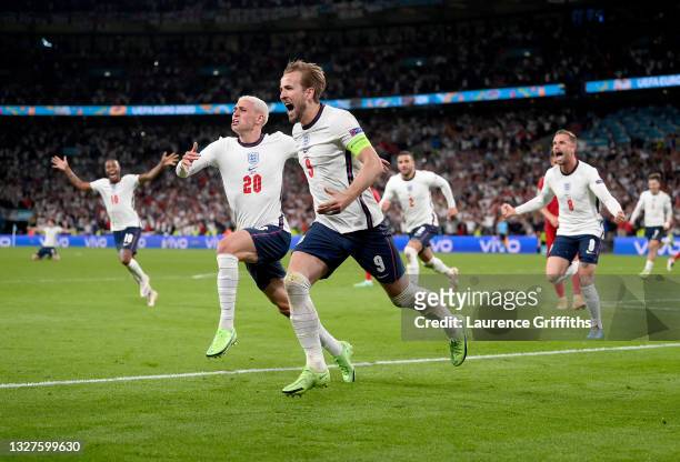 Harry Kane of England celebrates after scoring their side's second goal during the UEFA Euro 2020 Championship Semi-final match between England and...