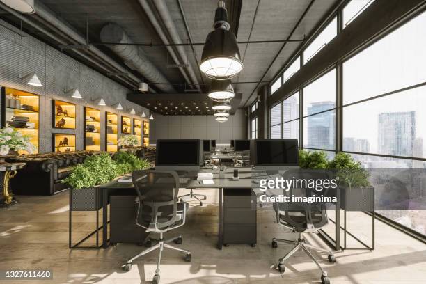 interior of a modern luxurious open plan co-working office space - green glass business stock-fotos und bilder