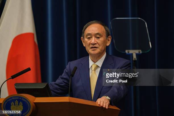 Japan's Prime Minister Yoshihide Suga speaks during a press conference at the prime minister's official residence on July 08, 2021 in Tokyo, Japan....