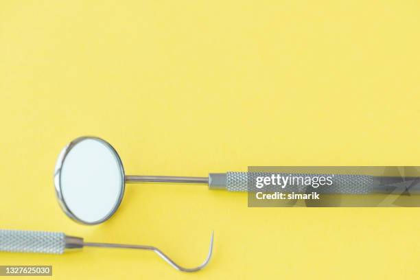 dental tools - dental explorer stockfoto's en -beelden