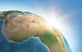 Sun shining on Earth over Africa