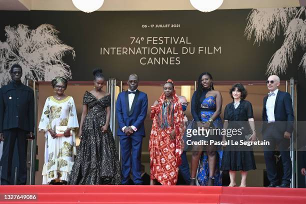Rihane Khalil Alio, Director Mahamat-Saleh Haroun and Achouackh Abakar attend the "Lingui" screening during the 74th annual Cannes Film Festival on...
