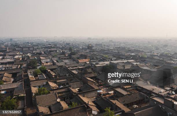 aerial time lapse of pingyao ancient city, a traditional chinese old city in shanxi - shanxi province stock pictures, royalty-free photos & images