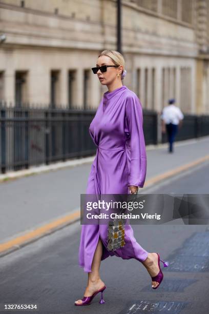 Justyna Czerniak is seen wearing pink dress,Paco Rabanne bag outside Zuhair Murad on July 07, 2021 in Paris, France.