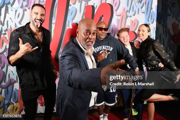 Adil Rami, Richard Hutchins, Damon Dash, Charlie "Rocket" Jabaley and NAUSICAA attend the red carpet art show for artist Richard Hutchins at The Cool...