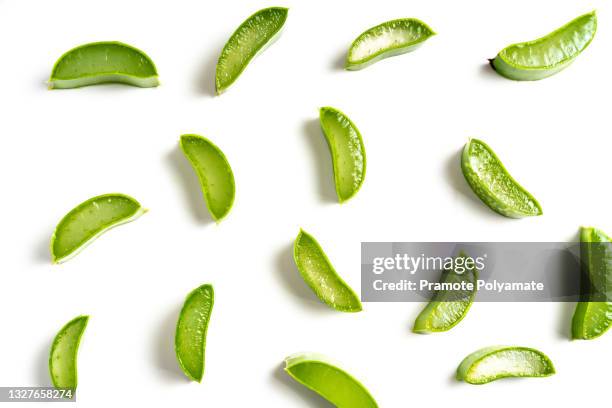 flat lay (top view) of aloe vera sliced isolated on white background. - aloe slices stock pictures, royalty-free photos & images