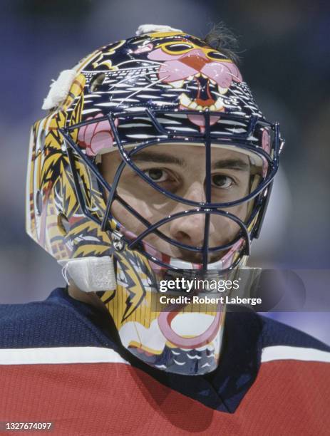 Roberto Luongo, Goalkeeper for the Florida Panthers looks out from behind his face mask as he tends goal during the NHL Western Conference, Pacific...