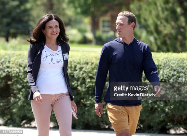 Of Facebook Mark Zuckerberg walks with COO of Facebook Sheryl Sandberg after a session at the Allen & Company Sun Valley Conference on July 08, 2021...